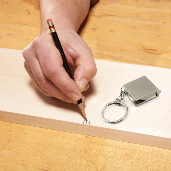 Metre ruban miniature pour travaux sur bois 