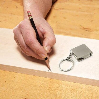 Metre ruban miniature pour travaux sur bois 