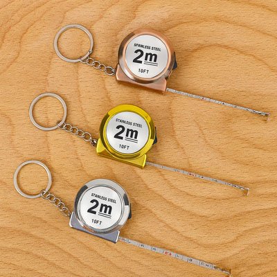 Metre ruban porte-cles couleur or, argent et bronze