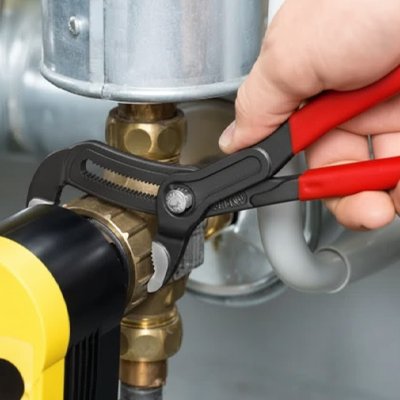 Pince multiprise rouge serrage raccord tuyau cuivre